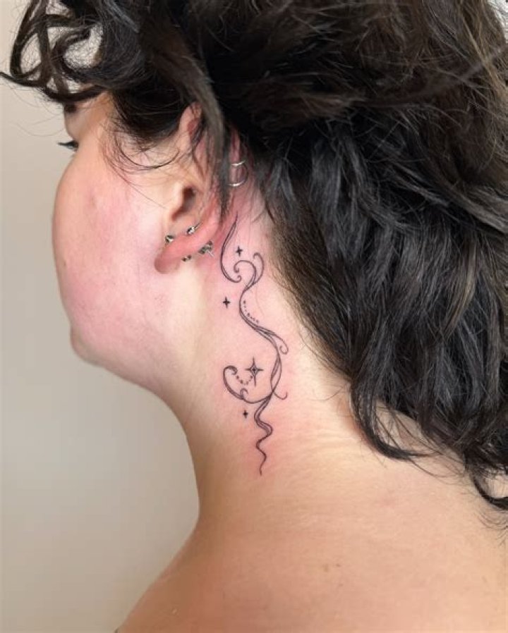Discover The Meaning And Beauty Of Faith Tattoos Behind The Ear